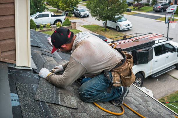 Professional Flat Roof Repair technician working in Charm, OH